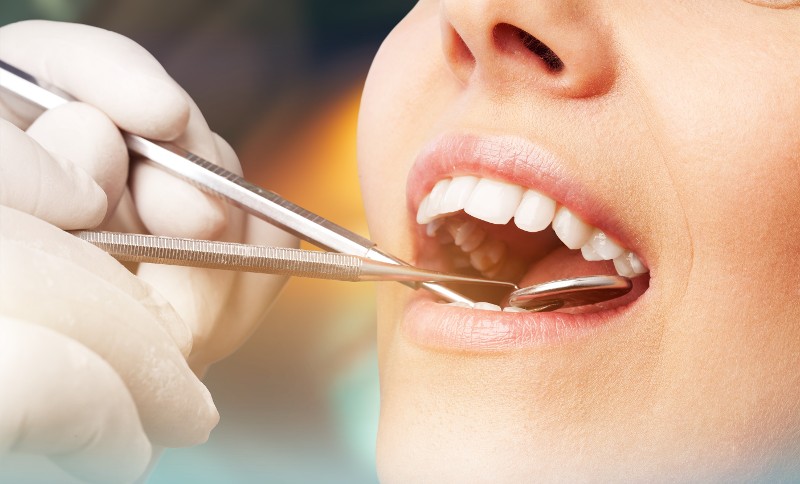 Zahnärztliche Untersuchung; Foto: Billion Photos - Shutterstock.com
